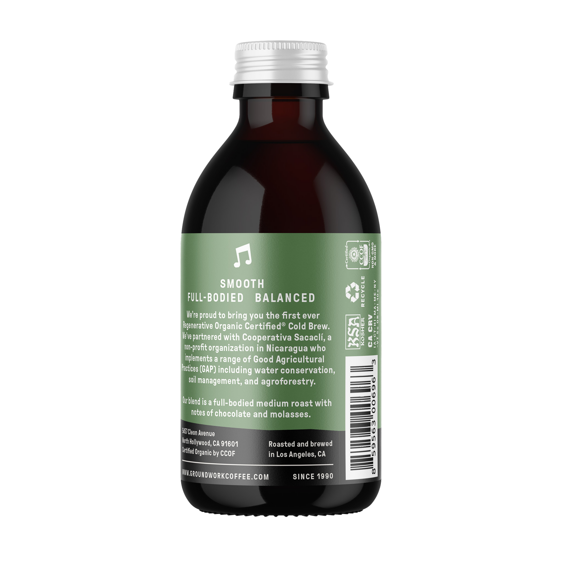A dark glass bottle with a green label for Groundwork Coffee Co Regenerative Organic Certified® Cold Brew, featuring Smooth, Full-Bodied, Balanced notes and sustainability info.