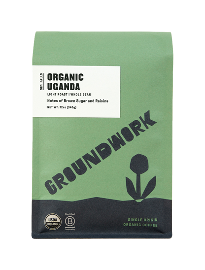 A green bag of Groundwork Coffee Uganda: Bugisu Sipi Falls Project light roast whole bean, single origin and USDA organic, with brown sugar and raisins notes.