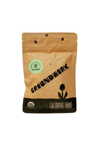 A brown, resealable bag of Groundwork Coffees Coffee Sample with organic and BSA Roasted logos at the bottom.